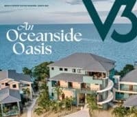 Cover of a magazine featuring coastal buildings with ocean views and the title "An Oceanside Oasis."