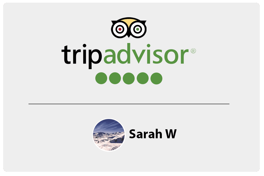 Tripadvisor logo with a user profile for Sarah W, featuring a snowy landscape.